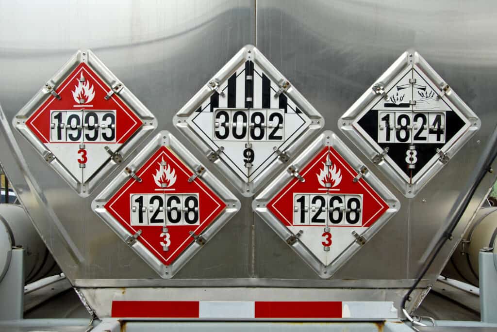 USDOT Hazardous Materials Transportation Placards on rear of a Fuel Tanker