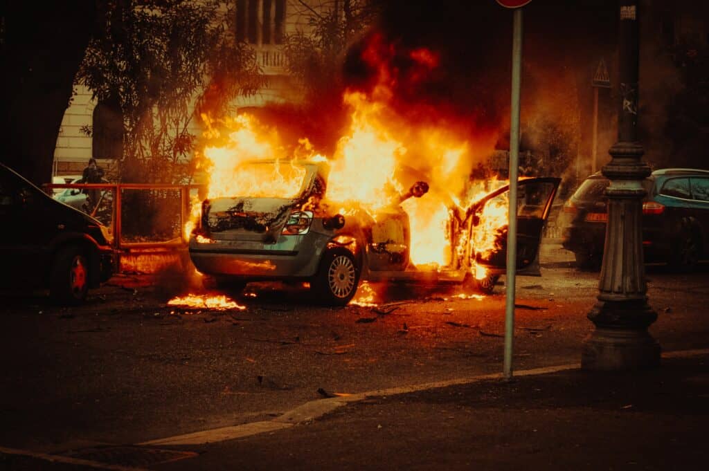 car burning during riot
